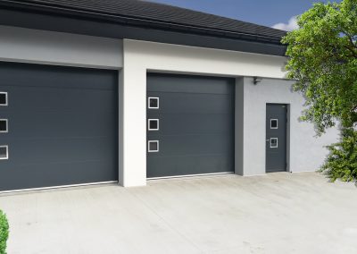 Bramy garażowe segmentowe antracytowe z nierdzewnymi okienkami