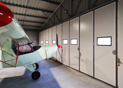 Brama harmonijkowa do hangaru lotniczego od srodka Migas-Door