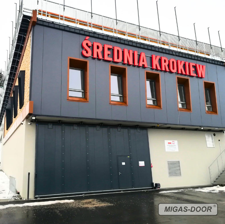 Brama-przemysłowa-podwieszana-przesuwna-migas-door Bramy dwuskrzydłowe obłożone drewnem Migas-Door